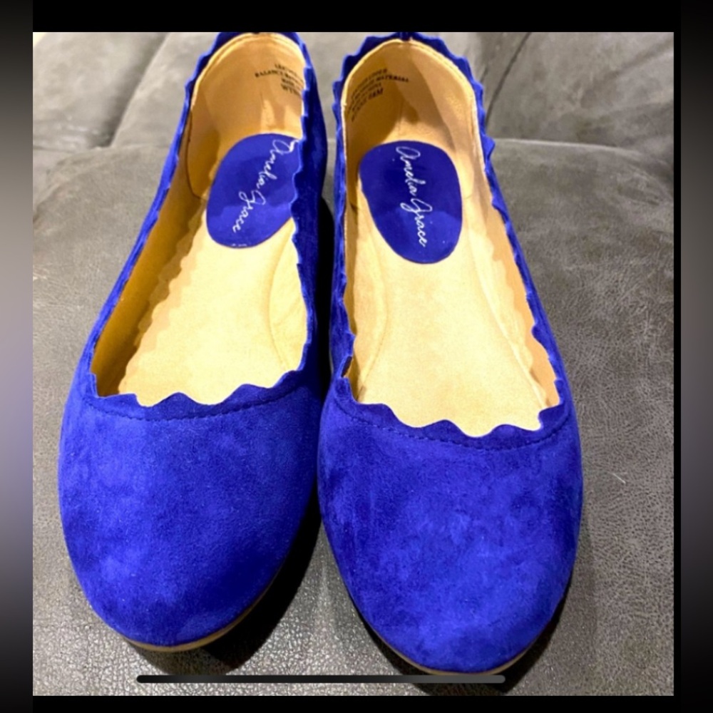 women’s flats size 6.5 blue suede like material. Worn only once.  Like new